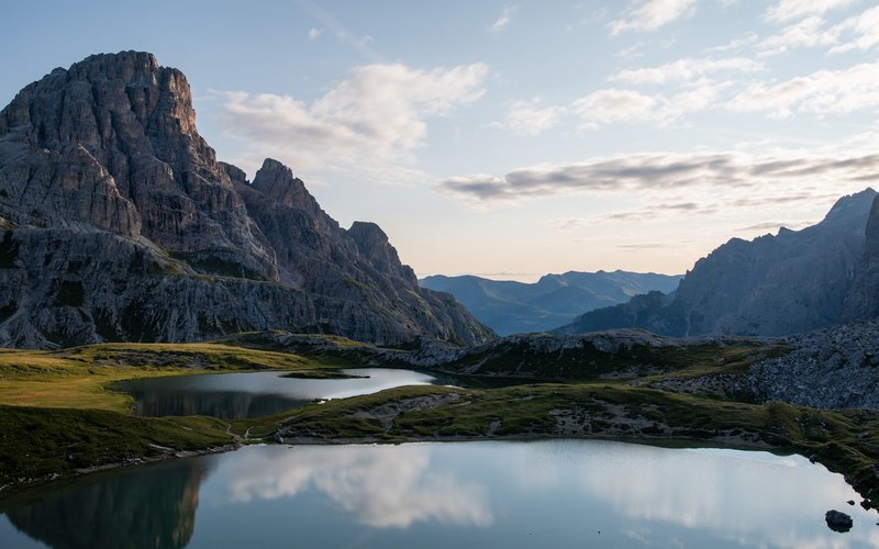 Photo from Unsplash (mountain lake landscape).